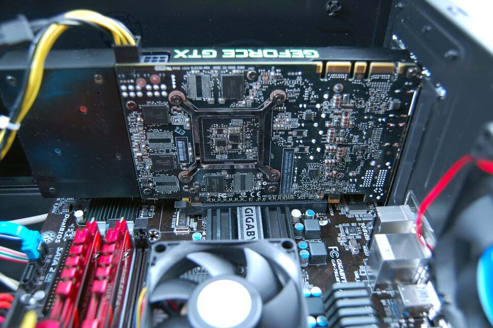 In goes the GPU. The supplied PSU has a power cable for the graphics card, but we'll need use a dual molex to PCIe power adaptor to supply the other connector