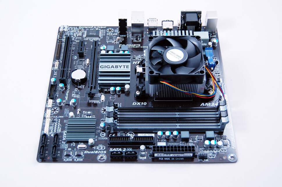 In goes the CPU, in this case an AMD FX-6300 six core processor, with included heatsink and fan. This 3.5GHz chip is rather overclockable, but you'll need a better cooling solution than this