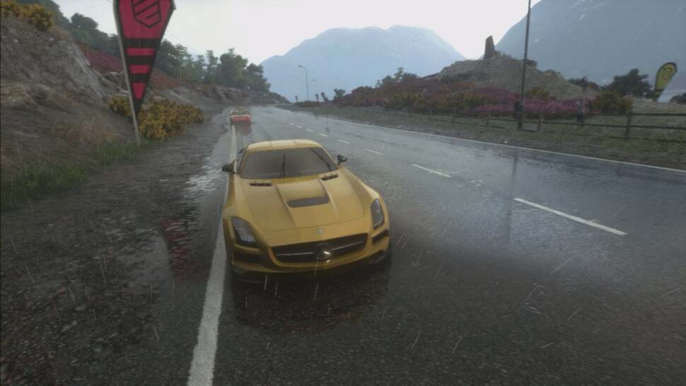 From headlamps to brake lights, all light sources are reflected. Consistency is the key word here; world detail up to the mountaintops is mirrored across the dampened tarmac.