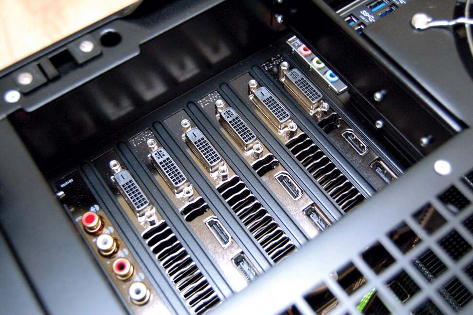 Yes, that's a total of 12 different digital video outputs available from the Titan SLI set-up, with an Asus Xonar Essence STX audiophile sound card on the left.