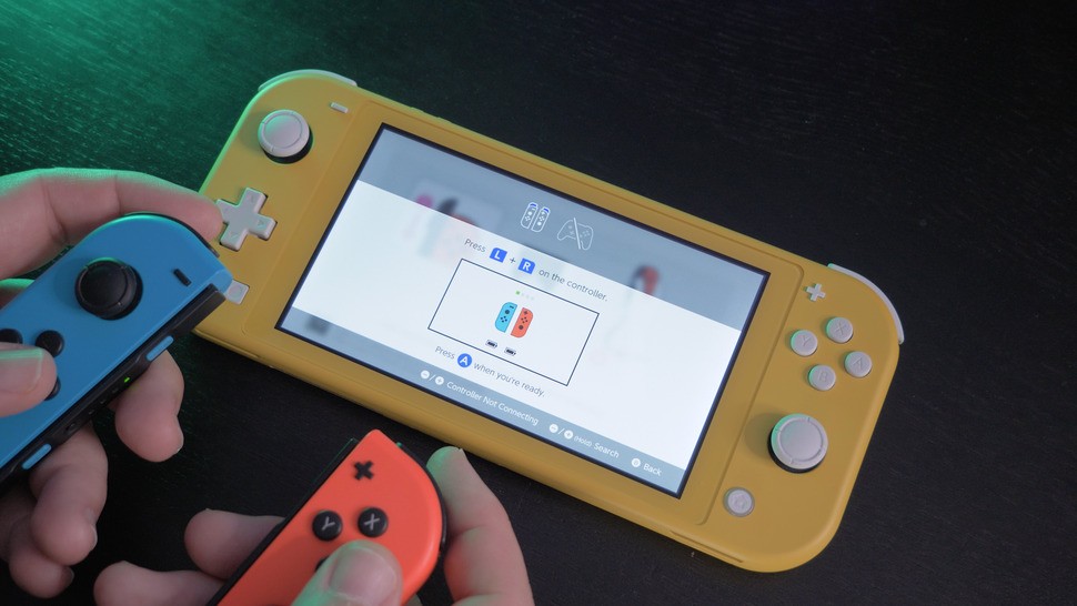 You can play Nintendo Switch Sports on the Switch Lite, but you'll need to pair Joy-Cons and lay the handheld flat owing to the lack of kickstand. It's not great - and split-screen two-player is literally 'off the table'