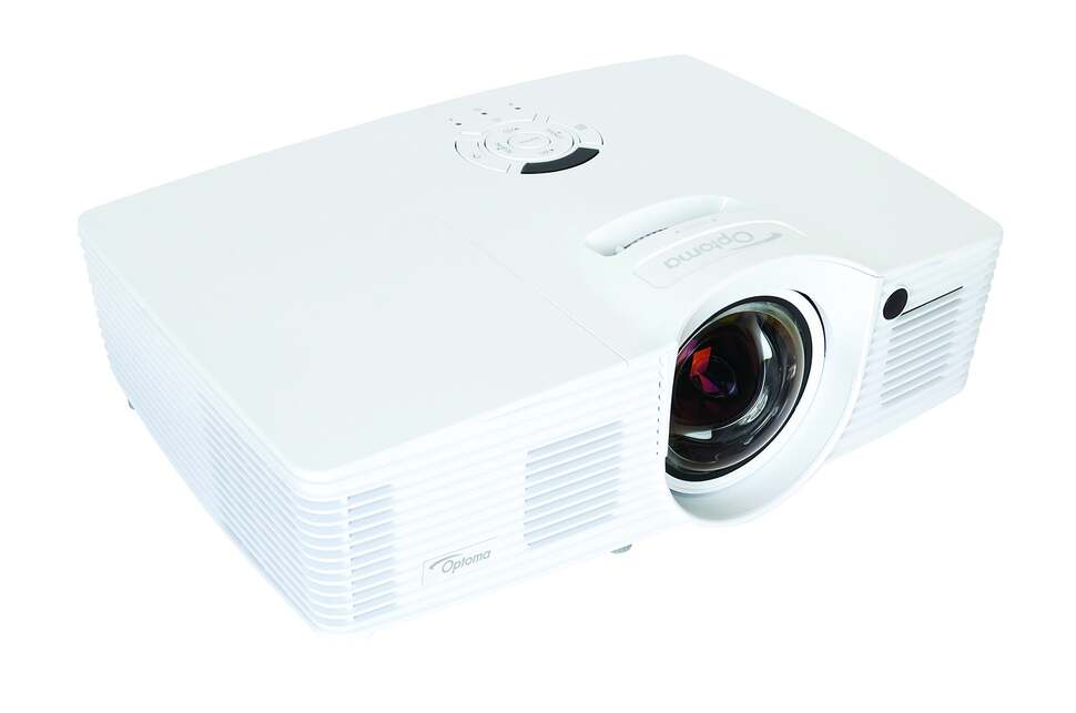 The Optoma GT1080 displayed from a different angles. The unit is lightweight and compact enough to easily fit onto a small table, while the remote control is backlit allowing the user to see what buttons they are pushing in a pitch black viewing environme