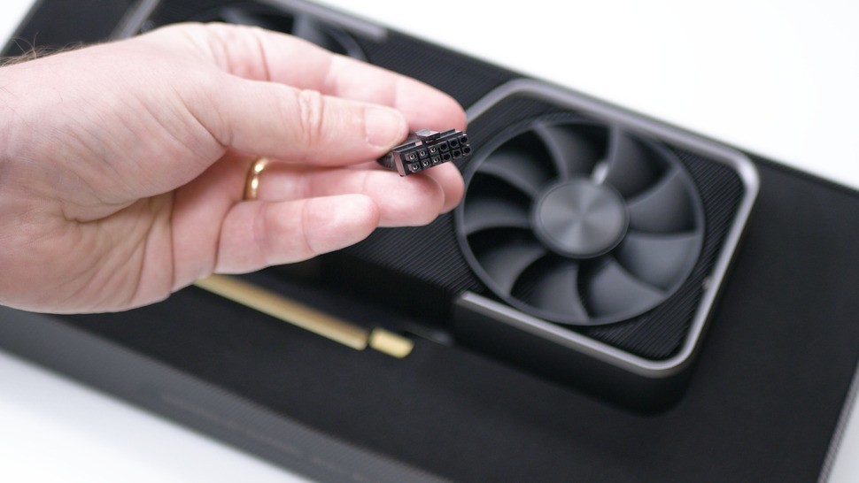 You get an adapter for the power socket - it mates a standard eight-pin PCIe cable to the new power input