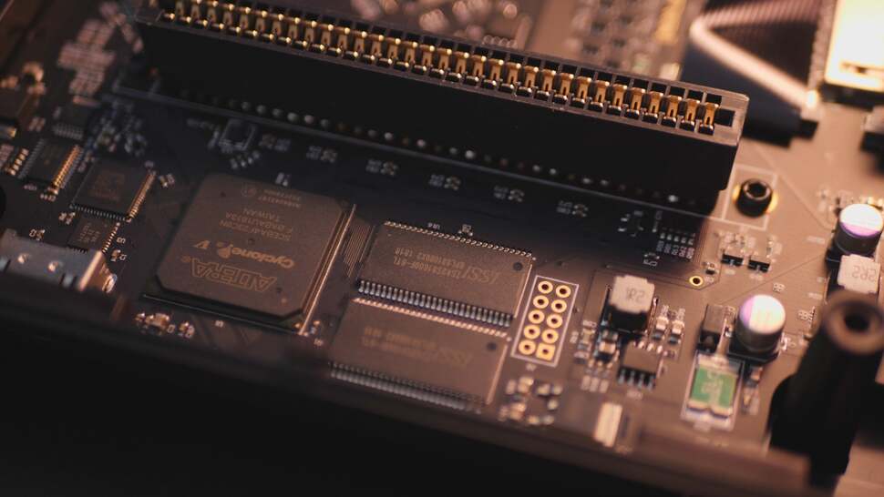 Cracking upon the casing reveals all. The key to the Mega Sg's accuracy is the use of a programmable FPGA processor - it's more of a simulator of original hardware than an emulator