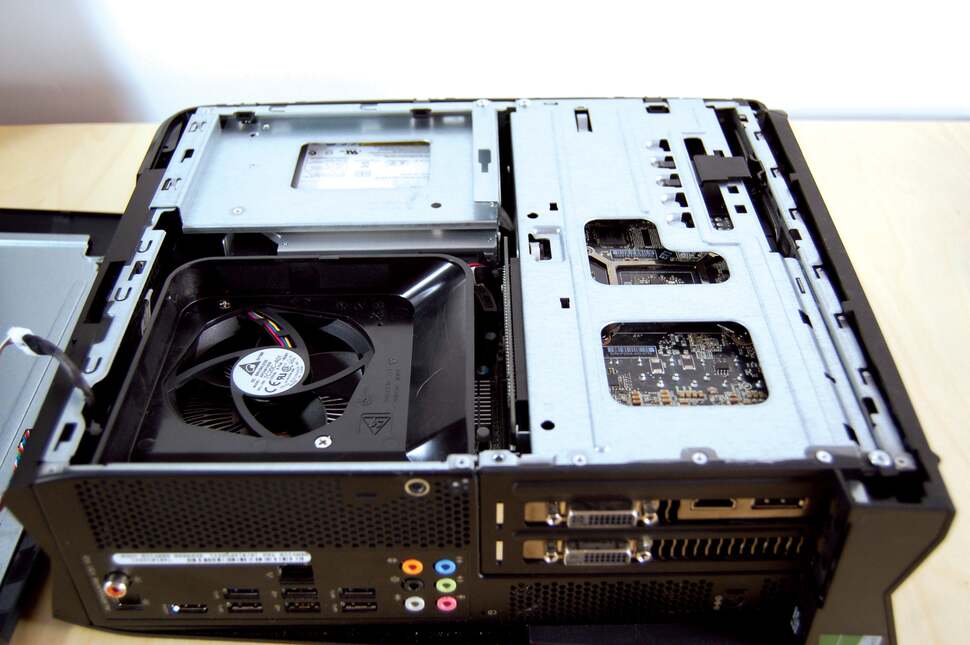 Opening up the case you get some idea of how well designed the internals are. The graphics card is safely enclosed to the right, the CPU is right in front of us to the left with the optical drive directly behind it