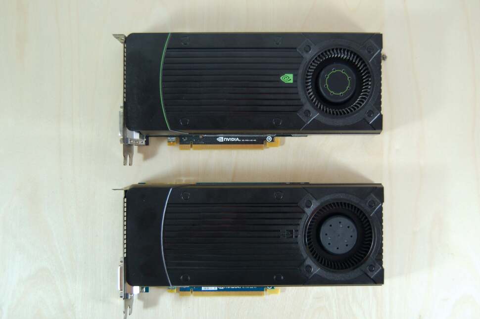 The graphics card contained in our test unit (bottom) seems to be virtually identical to the standard Nvidia reference model (top). It's fairly quiet in a desktop unit, but not so unobtrusive in the X51. A custom design could have made all the difference