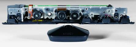 Microsoft released new images showing the Kinect sensor uncased. Four microphones (three to the right, one to the left) account for the width. Multiple PCBs suggest that the device really is somewhat more advanced than you might think and fairly expensive to build. There's a durable motor in there, plus a fan to dissipate heat. Kinect tracks you, adjusting the camera angle for the best view of the player.