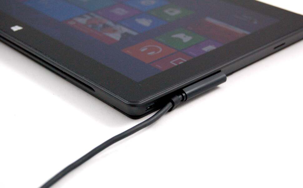 Here you can see how the power cable blocks the mini-displayport video output. The connection is reversible, but it still grates