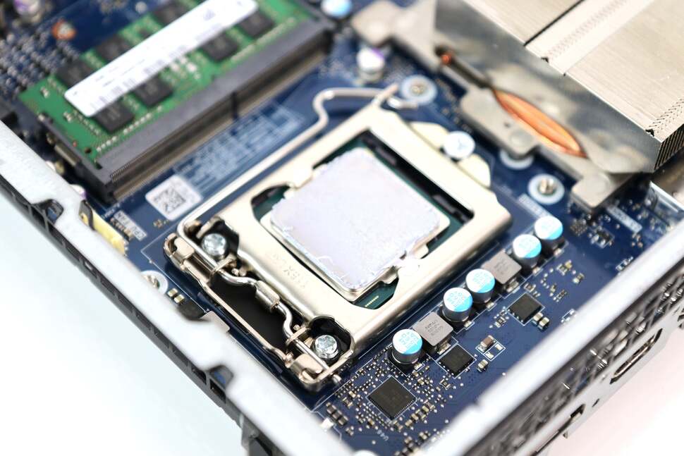 Peeling back the CPU cooler, we find the Core i5 6400T in a standard Socket 1151 bay. It's easily interchangeable with another Skylake chip of your choosing
