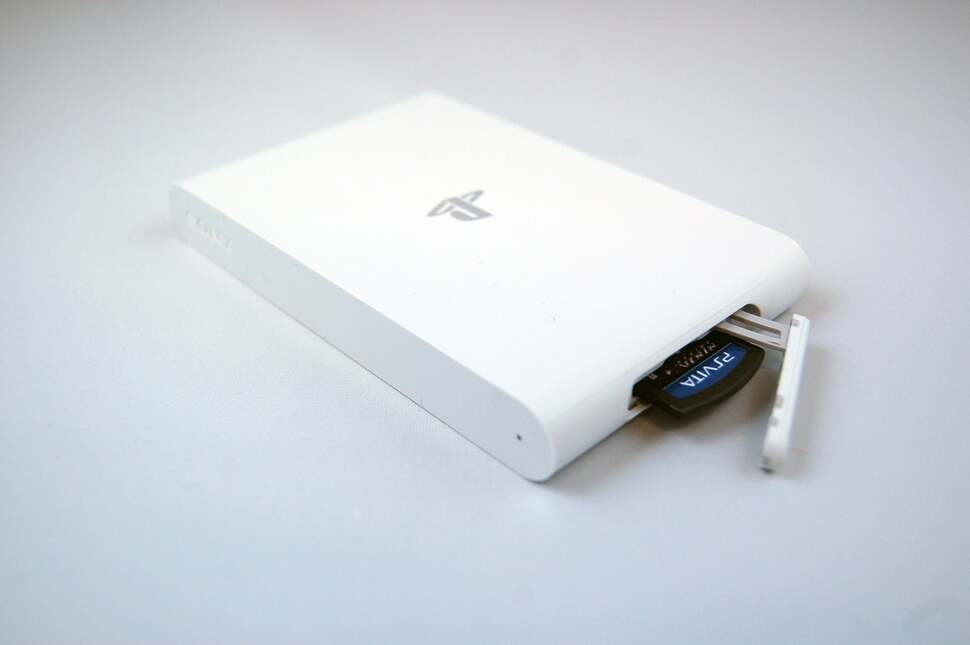 At the top of the device we find a concealed Vita-labelled port that takes your game cartridges, though our import model steadfastly refused to play any of our UK games