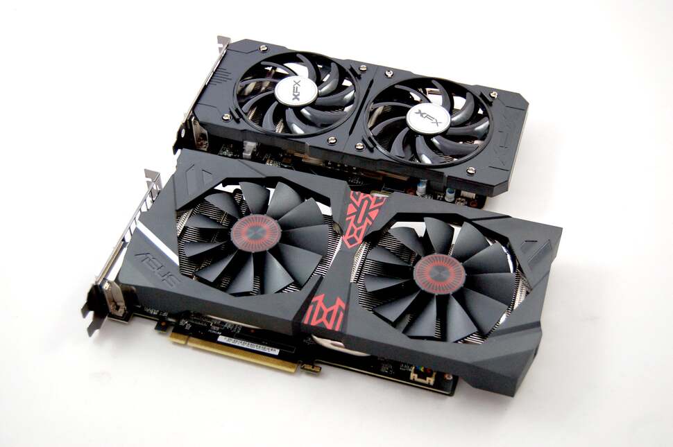 We have two R9 380s on test - the Asus Strix variant with its DirectCU2 cooler below, and the XFX Double Dissipation variant above