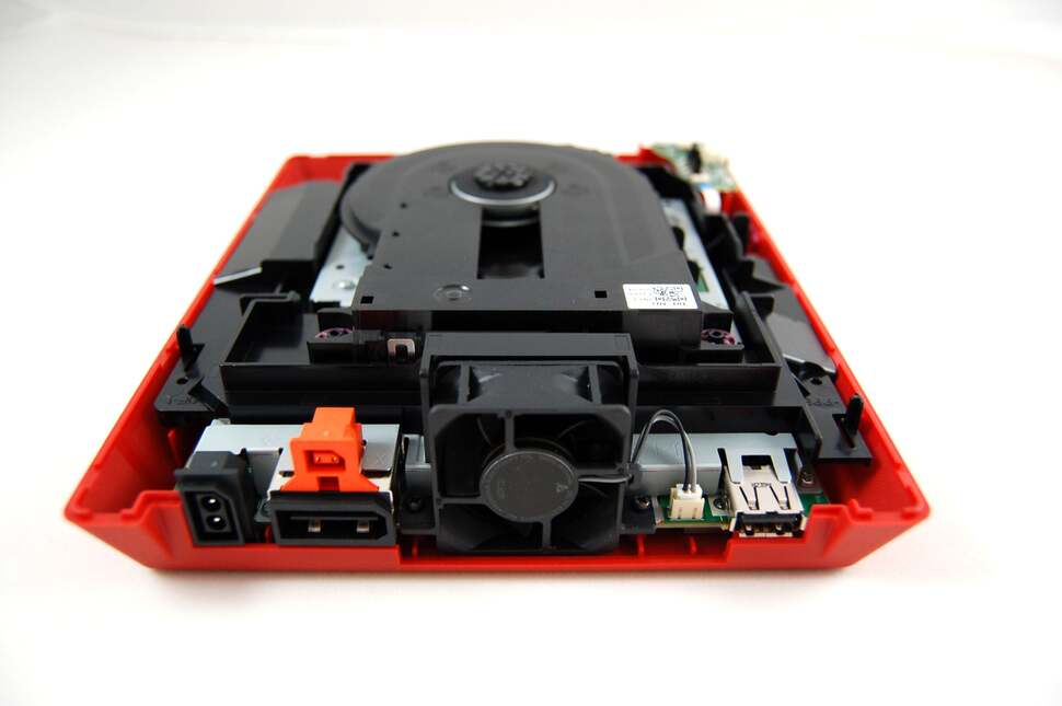 A rear-view look at the unit, showing the ports on offer plus the tiny fan and its power connector