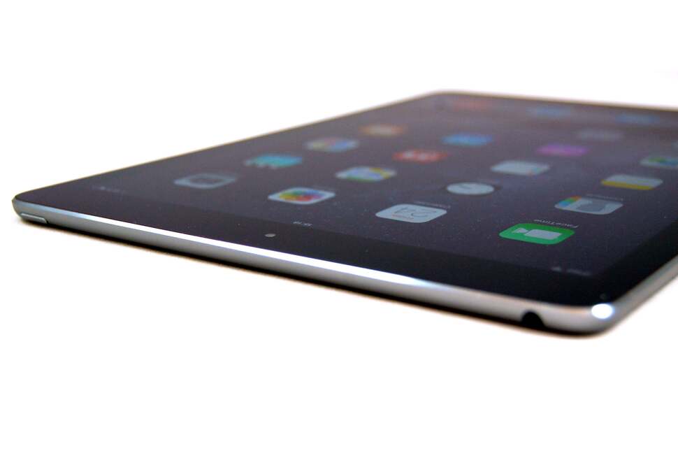 The power button and the 3.5mm stereo headphone jack are located at the top of the tablet