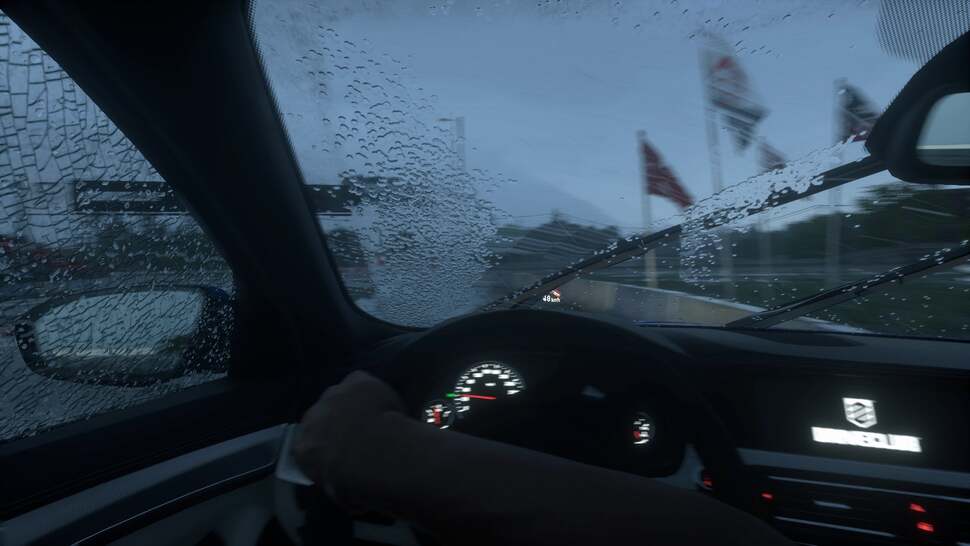 Rain droplets that collect on the windscreen are dynamic in nature and respond to forces of motion and the wiper blades themselves. Notice how the water is moving along with the car as it turns