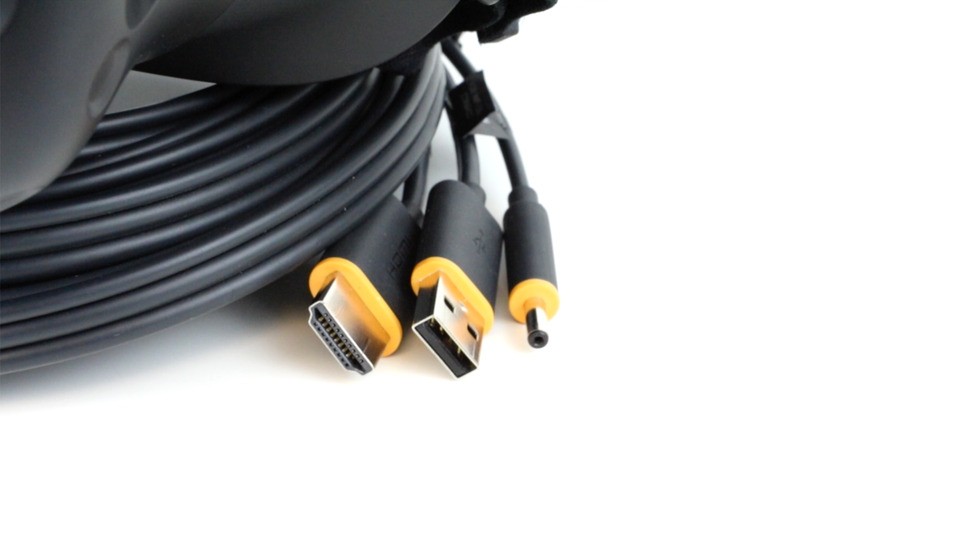Power, HDMI and USB cables. These snake back to a breakout box, which connects to your PC in turn