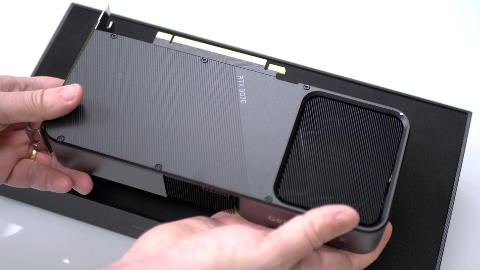 There's no 'flow through' fan design here though. It's not needed for a 220W card, it's a standard dual axial fan design instead