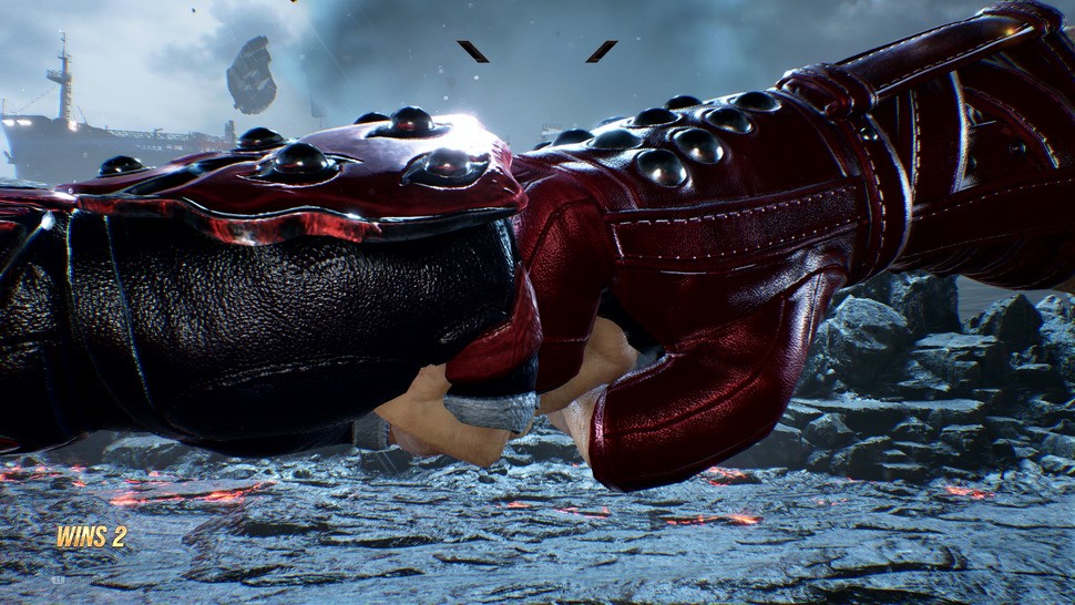 Pausing the moment that two fists collide in Tekken 8's story mode reveals the phenomenal detail and material work evident even on this small portion of the two fighters' outfits.