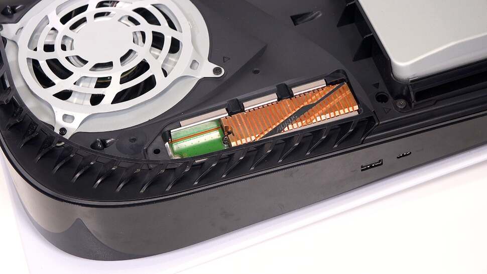 Push the drive into the PCIe gen 4 slot, adjust the spacer if needed, then screw into place