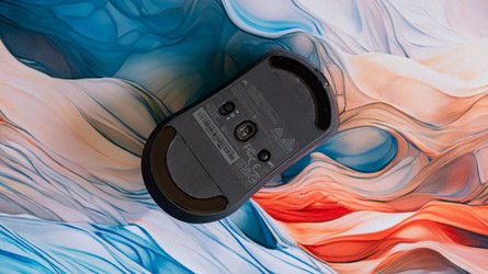 Left: the Sabre V2 Pro CF comes with a nice case, with room for the mouse, its wireless dongle and other bits. Right: the underside of the mouse includes a DPI button and a selector for Bluetooth support, something missing from the vanilla V2 Pro. 
