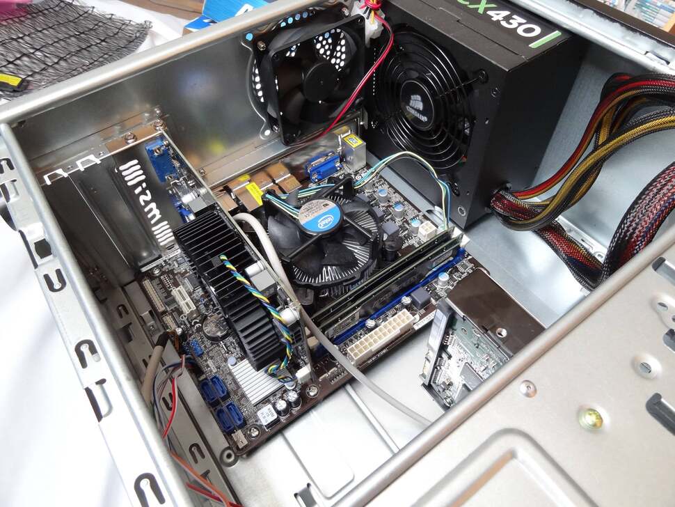 The graphics card is up next. There's enough room here for much longer cards, such as the 25 centimetre long HD 6870, meaning the relatively compact HD 6770 we're using slots in comfortably