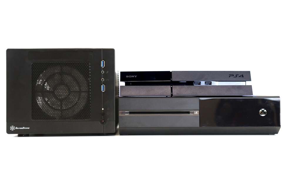 And here's our mITX built alongside Xbox One and PS4. Taller, thinner cases are usually preferred as they can usually hold full-size GPUs. However, what's clear is that the Nano could pave the way towards much smaller, console-sized PCs