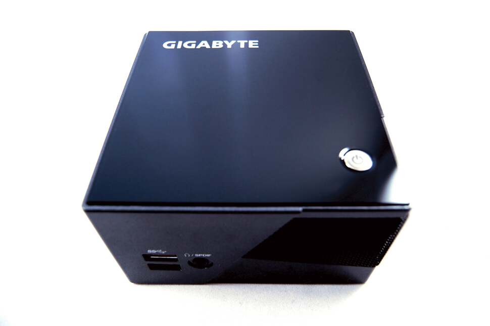 The Gigabyte Brix Pro in its native, unopened state. To gain access you need to turn it upside down and remove the baseplate of the unit