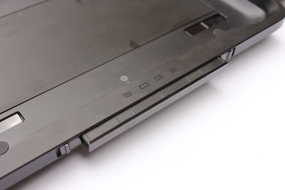 To assemble it, the Edge tablet is latched into the frame at the top, and then locked into place via a spring-loaded bar at the bottom