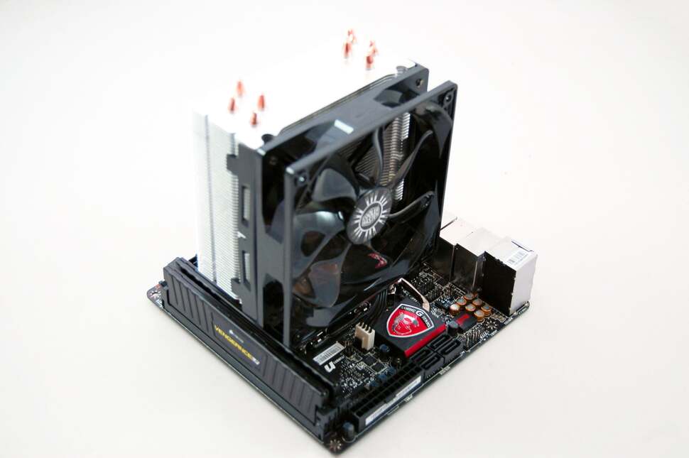 On goes the heatsink and fan - the popular Cooler Master Hyper 212 Evo. Now you can see why we needed to use low profile RAM modules