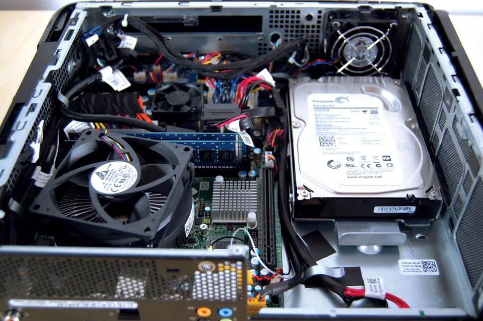 Removing the graphics card completely reveals the 2TB Seagate hard drive in our X51 review model, and we'd guess that this is where the new SSD caddy sits. Our test unit didn't have this - a 256GB SSD is a mammoth £300 upgrade