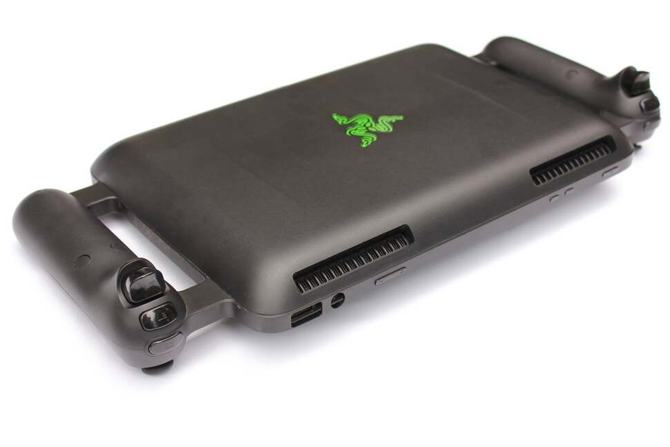 Cut-out openings are made to access the tablet's USB 3.0 port, and also to allow a air pathway for its fans. A passthrough is also used for the charging port on the bottom, though it can't be docked in this state