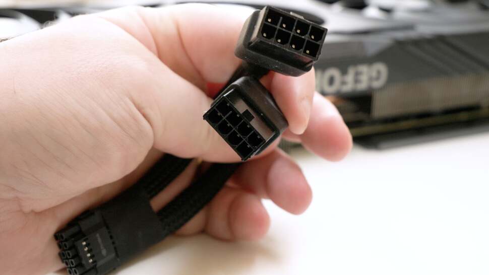 Power is supplied via this adapter - you plug in two eight-pin PCIe power plugs at the end