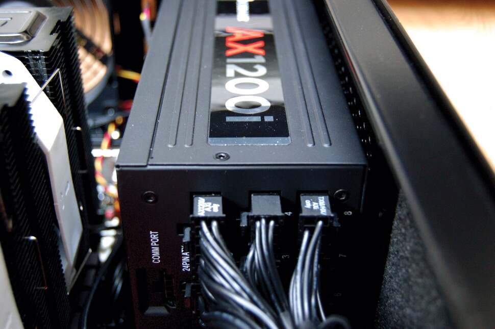 Corsair's AX1200i power supply has the wattage to keep both an overclocked CPU and three Titans fully armed and operational. At maximum warp, we saw 980W drawn from the mains