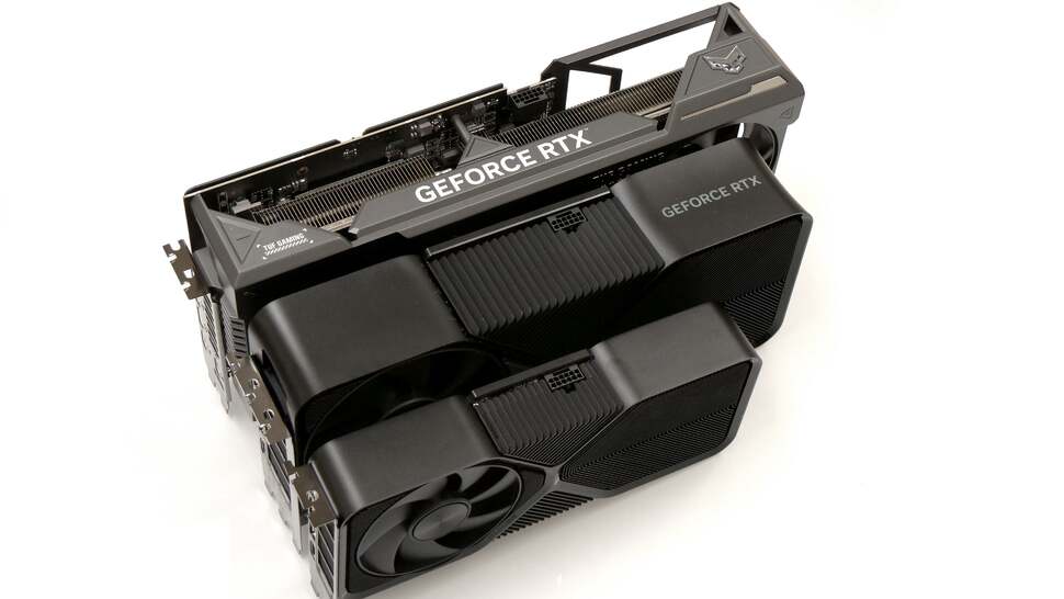 Just to emphasis the Gigantor-class size of these RTX 4080 Supers, here's a comparison shot alongside the reasonably sized RTX 4070 Super