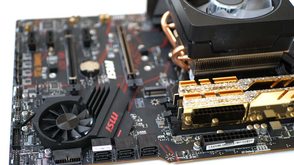 With cooler and memory in place, a look at how the board populates mid-build