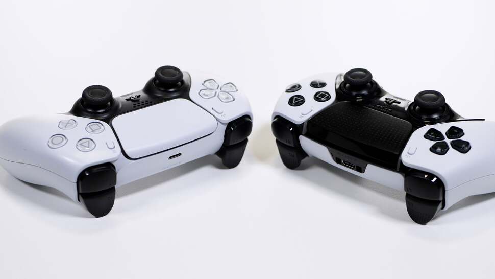 The DualSense Edge (right) is immediately distinguishable from the original thanks to its black buttons, d-pad and trackpad