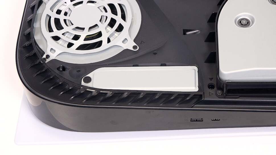 With the 'wing' removed, a Philips crosshead screwdriver is needed to expose the M.2 bay