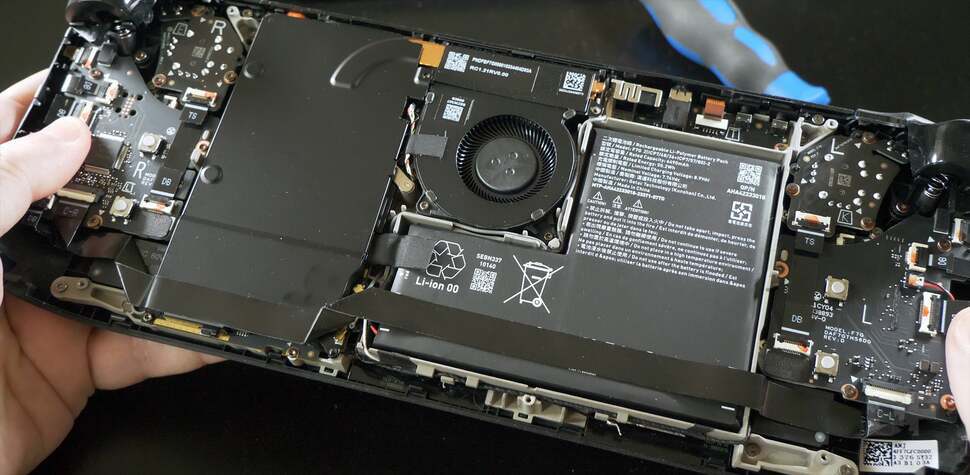 Inside the revised Steam Deck, with the bigger 50WHr battery next to the larger fan. Under that is a 6nm shrink of the Steam Deck's custom AMD processor.