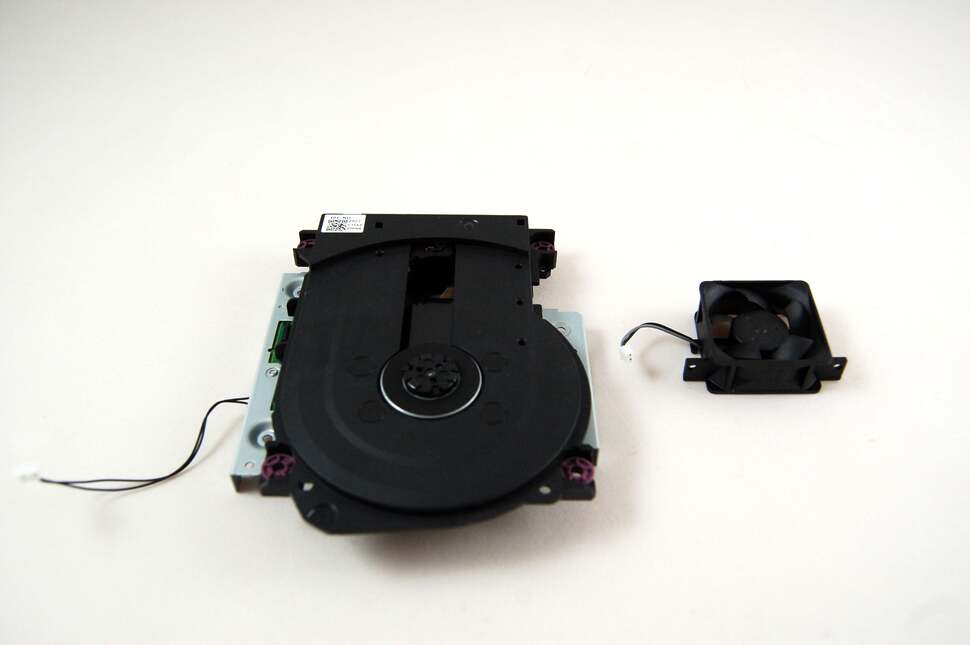 The fan and the optical drive assembly removed from the chassis and displayed here for your enjoyment