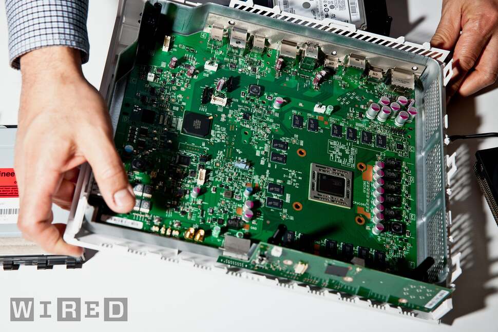 Until we get our hands on the final hardware, Wired's internal photography of a pre-production Xbox One remains our only look inside the box. Rumour-mongers should note the lack of discrete GPU - there's to be no last minute addition of extra processing hardware. All of Xbox One's major systems are built into the single chip on the right, which is surrounded by the 2133MHz DDR3 modules.