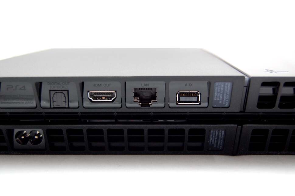 The rear of the unit reveals some serious heat exhausts along with digital video and audio outputs, a LAN socket plus the power input.