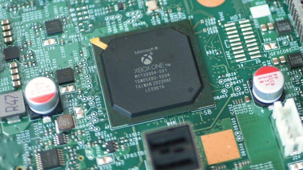 This is almost certainly the Southbridge board for I/O and it's... an Xbox One chip?