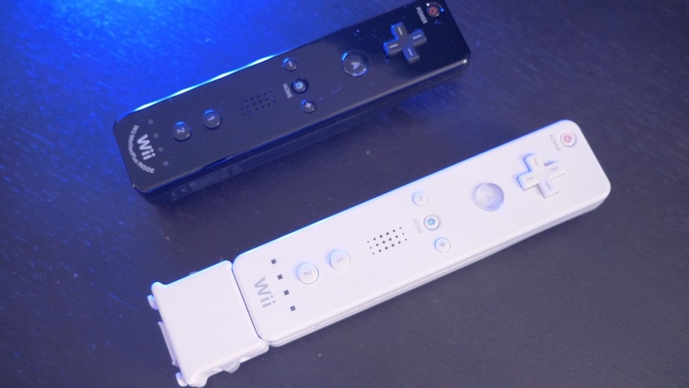 The original Wiimote (top) and its Motion Plus add-on (bottom). Motion Plus radically improved 3D tracking and was also integrated into a standalone 'evolved' rendition of the controller