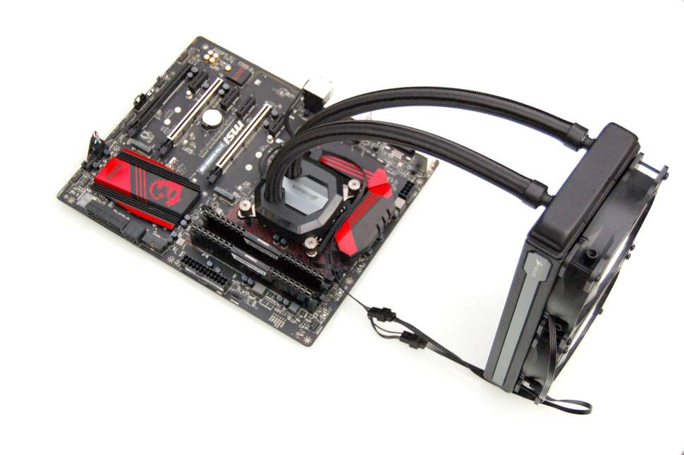 The MSI board with the full closed-loop cooler set-up in place. The radiator is mounted to the wall of the case, directly above the board