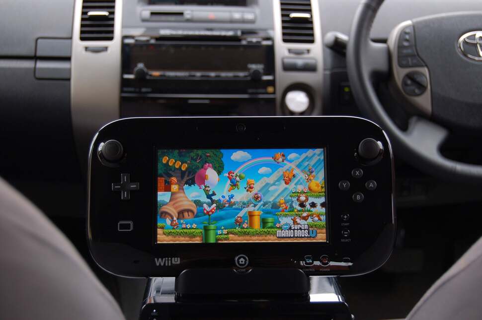 Not a trick, not an illusion. The MaxPlay adaptor works fine in powering Wii U on the road, running from the cigarette lighter power socket. Superb for keeping the kids occupied in long trips and keenly priced at £19