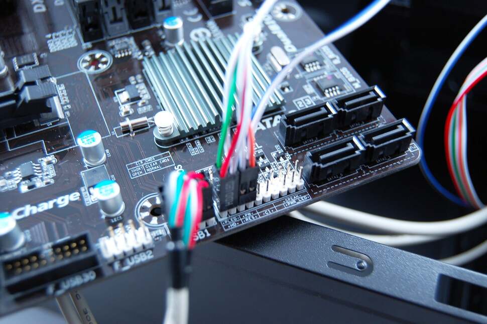 Here we're attaching the front USB cables from the case, along with power button, reset button and LEDs
