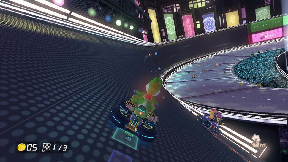 The mag-racing sections allow for some interesting track design providing a full view of opponents on a completely different section of the track. Notice the digital trailing effect behind each racer. Small touches like this appear in a number of courses