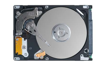 A hard drive on the left, an SSD on the right. The HDD has a head that scans across the platter for the right part of the disk from which to read in data, while the SSD has no moving parts, meaning virtually instant access to any file, anywhere.