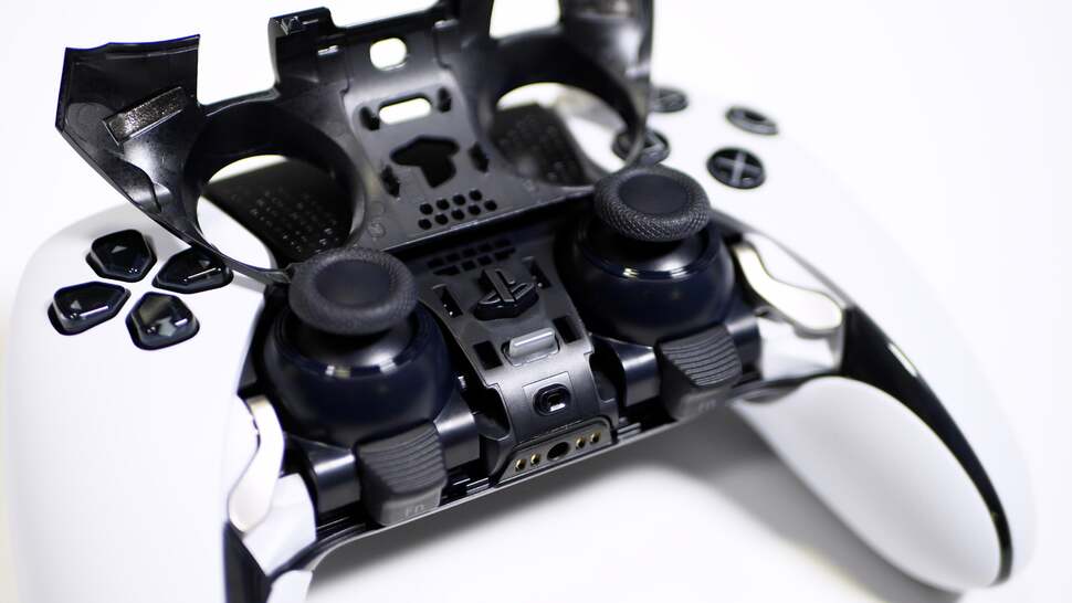 Like a car bonnet, part of the controller lifts up to allow access to the stick modules for replacement